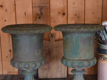 Pair of antique Medici urns with dark green patina For Cheap