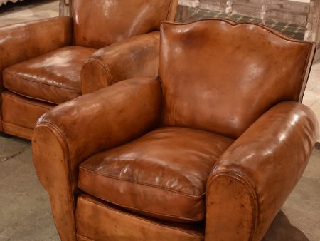 Pair of French leather club chairs - moustache back Supply