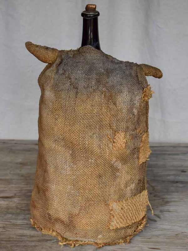 Antique French carboy in jute Supply